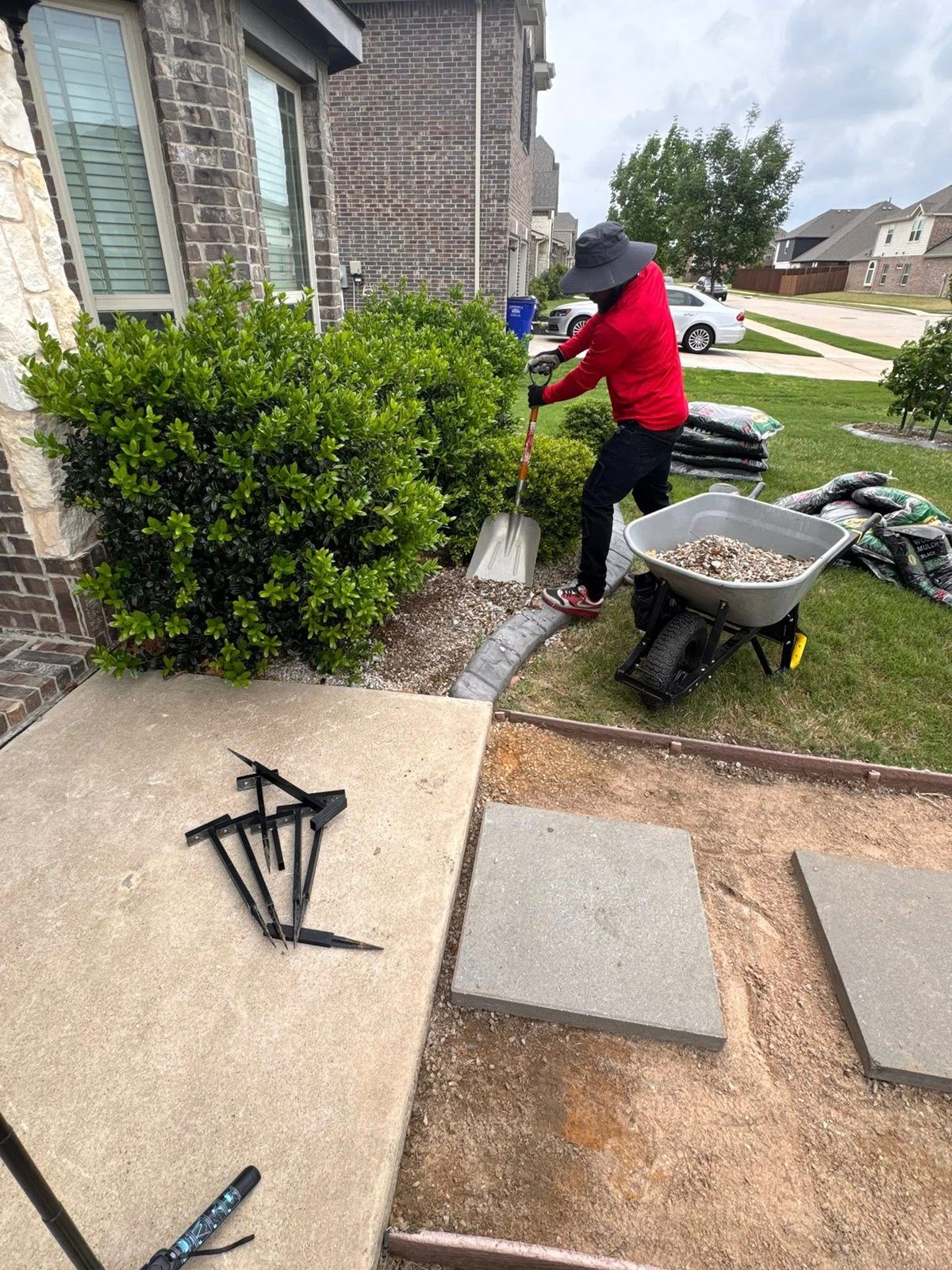 Hardscape and mulch landscaping work at a residential home